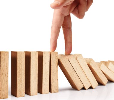 Devamlı devrilmiş bir domino taşı.