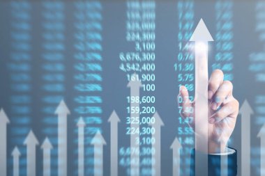 Bir ekrandaki resimli grafikler borsa finansal verileri analiz ediliyor