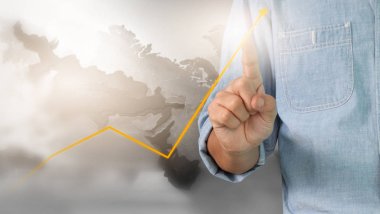 Bir ekrandaki resimli grafikler borsa finansal verileri analiz ediliyor