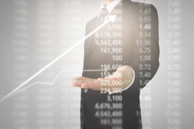 Bir ekrandaki resimli grafikler borsa finansal verileri analiz ediliyor