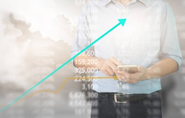 Bir ekrandaki resimli grafikler borsa finansal verileri analiz ediliyor