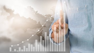 Bir ekrandaki resimli grafikler borsa finansal verileri analiz ediliyor