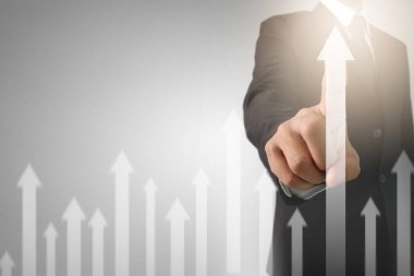 Bir ekrandaki resimli grafikler borsa finansal verileri analiz ediliyor