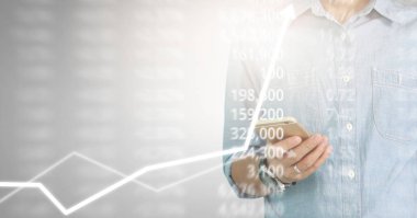 Bir ekrandaki resimli grafikler borsa finansal verileri analiz ediliyor