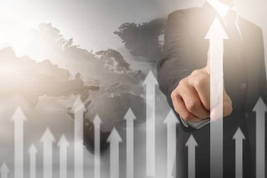 Bir ekrandaki resimli grafikler borsa finansal verileri analiz ediliyor