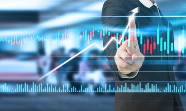 İşadamı, işinde grafik büyümesi ve grafik artışı için olumlu göstergeler planlıyor