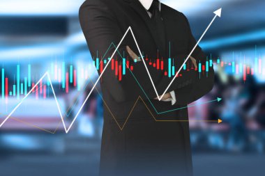 İşadamı, işinde grafik büyümesi ve grafik artışı için olumlu göstergeler planlıyor