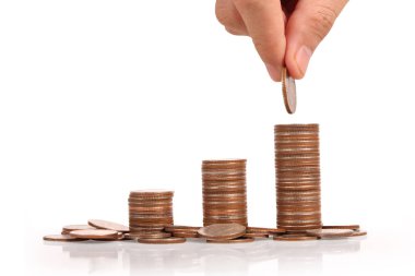 Para sikke yığını büyüyen iş elinde, para kavramı