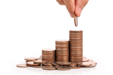 Para sikke yığını büyüyen iş elinde, para kavramı