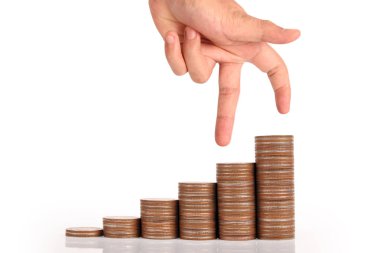 Para sikke yığını büyüyen iş elinde, para kavramı