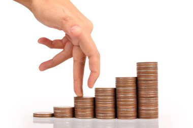 Para sikke yığını büyüyen iş elinde, para kavramı