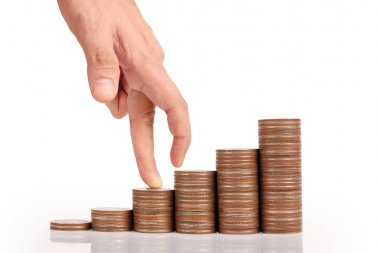 Para sikke yığını büyüyen iş elinde, para kavramı