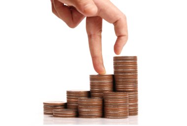 Para sikke yığını büyüyen iş elinde, para kavramı