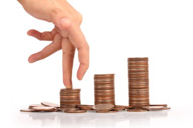 Para sikke yığını büyüyen iş elinde, para kavramı