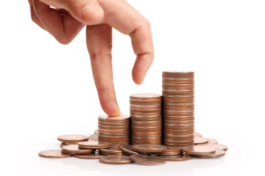 Para sikke yığını büyüyen iş elinde, para kavramı