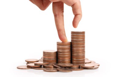 Para sikke yığını büyüyen iş elinde, para kavramı