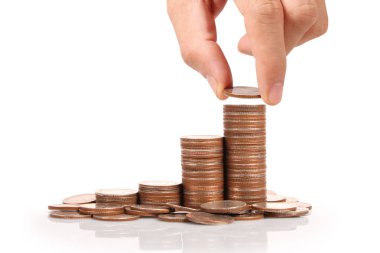 Para sikke yığını büyüyen iş elinde, para kavramı