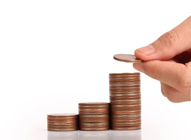 Para sikke yığını büyüyen iş elinde, para kavramı