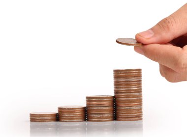 Para sikke yığını büyüyen iş elinde, para kavramı