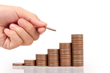 Para sikke yığını büyüyen iş elinde, para kavramı