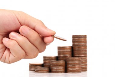 Para sikke yığını büyüyen iş elinde, para kavramı