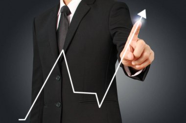 Elden gelen finansal sembollere sahip iş adamı, dokunma grafiği