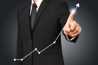 Elden gelen finansal sembollere sahip iş adamı, dokunma grafiği