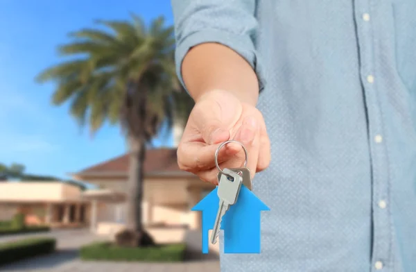 house key in a hand