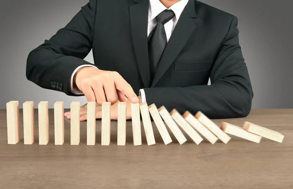 Hand Stopping Domino Concept Business Solution — Stock Photo, Image
