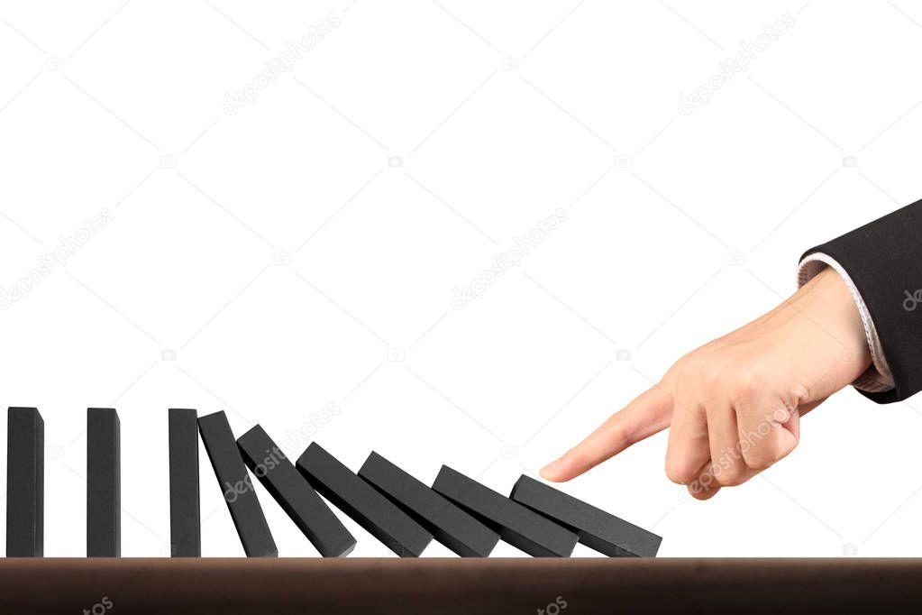 Hand Stopping domino concept 