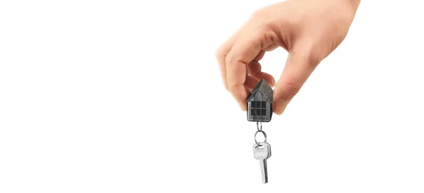 Agent nieruchomości przekazujący klucze do domu w ręce — Zdjęcie stockowe