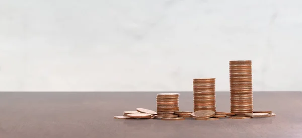 Dropping Coins  stacks Labeled Retirement ,business  idea — Stock Photo, Image