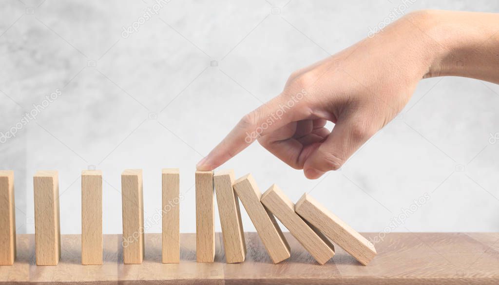 Hand and Domino effect stopped by unique