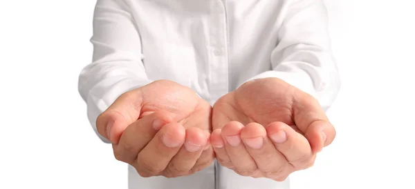 Young man giving empty hand. showing concept — Stockfoto