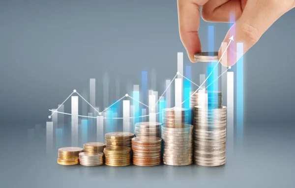 Coins graph stock market — Stock Photo, Image