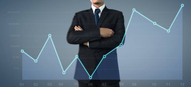 İşadamı, işinde grafik büyümesi ve grafik artışı için olumlu göstergeler planlıyor