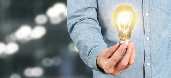 Hand Holding Illuminated Light Bulb Idea Innovation Inspiration Concept — Stock Photo, Image