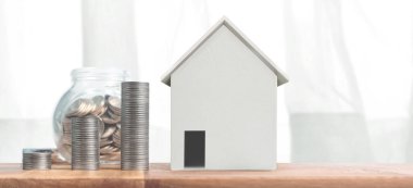 Emlak yatırımı ve ev ipoteği finansal konsept para yığını. iş evi fikri