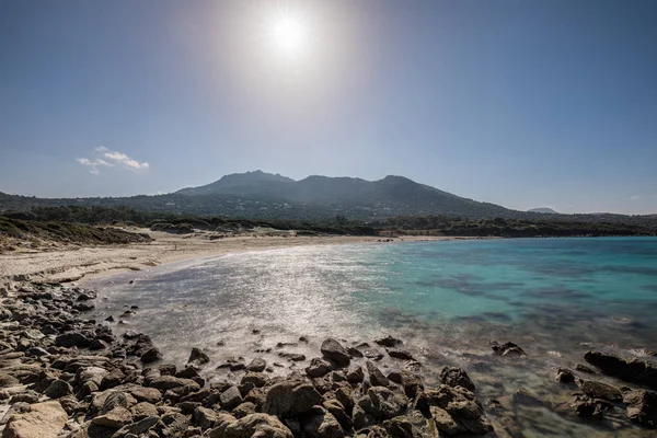 Deserted Bodri beach in Corsica with rocky shoreline — Stock Photo, Image