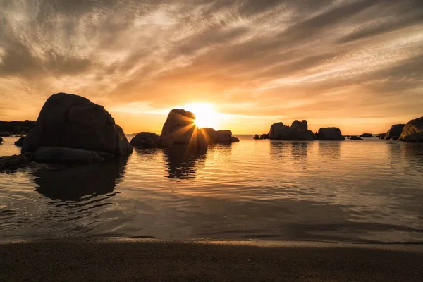 Sunrise over boulders on Cavallo Island south of Corsica — Stock Photo, Image