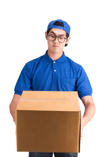 Entrega homem com dúvidas sobre uma caixa — Fotografia de Stock
