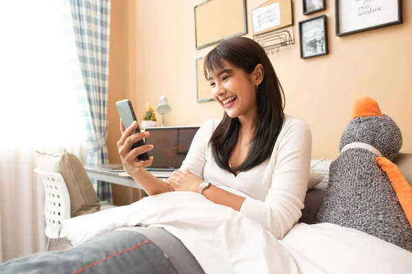Young Asian Woman Works Home Tablet Computer Enjoys Morning Weekend Royalty Free Stock Images