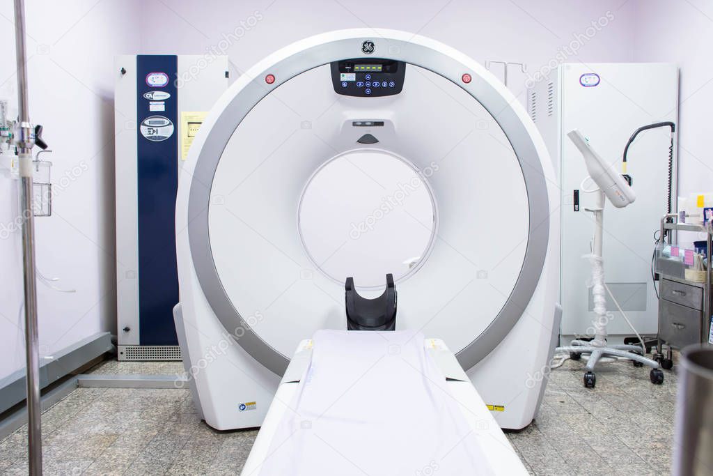 CT Scan Machine In Radiology Room on white background.