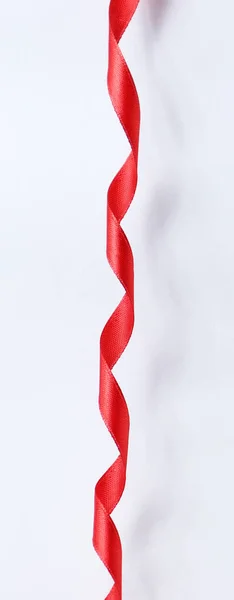 Spiral of thin red ribbon stock photo. Image of background - 61905602