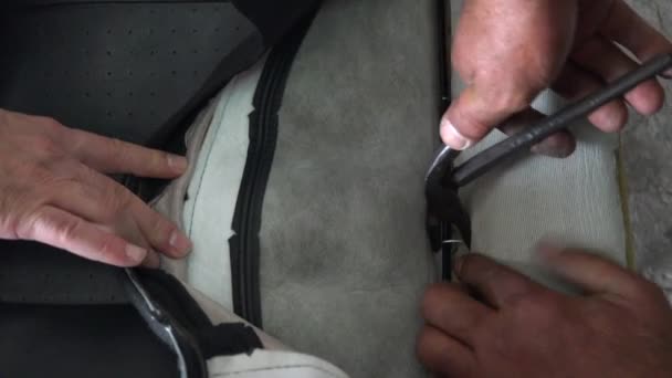 Hog Ring Attachment Leather Seat Cover Installation Hog Ring Attachment — Stockvideo