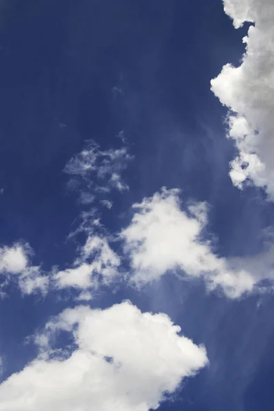 Fluffy White Clouds Deep Blue Sky Negative Space Copy — Stock Photo, Image