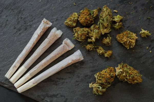 Marijuana Joints Ready Smoke Pile Weed Buds Black Stone Table — Stock Photo, Image