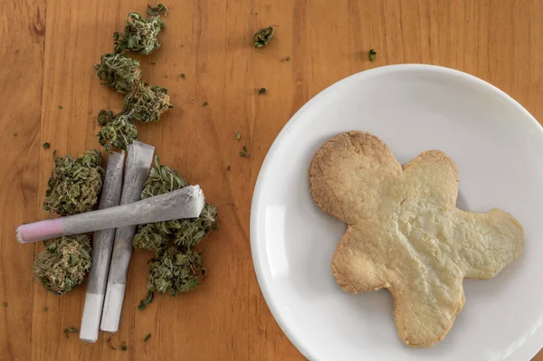 Pile Marijuana Buds Rolled Joints Dish Big Cookie Marijuana Shape — Stock Photo, Image
