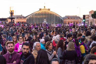 Madrid, Spain - March 8, 2019: Feminist Strike on the Women Day of 2019 in the city center of Madrid, Spain. Feminist demonstration of women, 8M. clipart