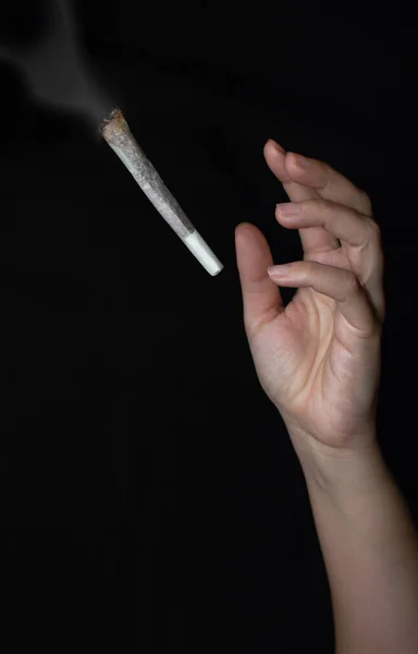 Cannabis Background Hand Trying Catch Big Lit Joint Marijuana Isolated — Stock Photo, Image